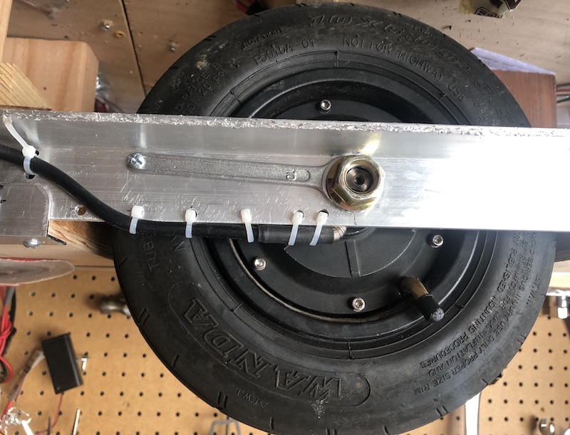 Wrench holding axle
